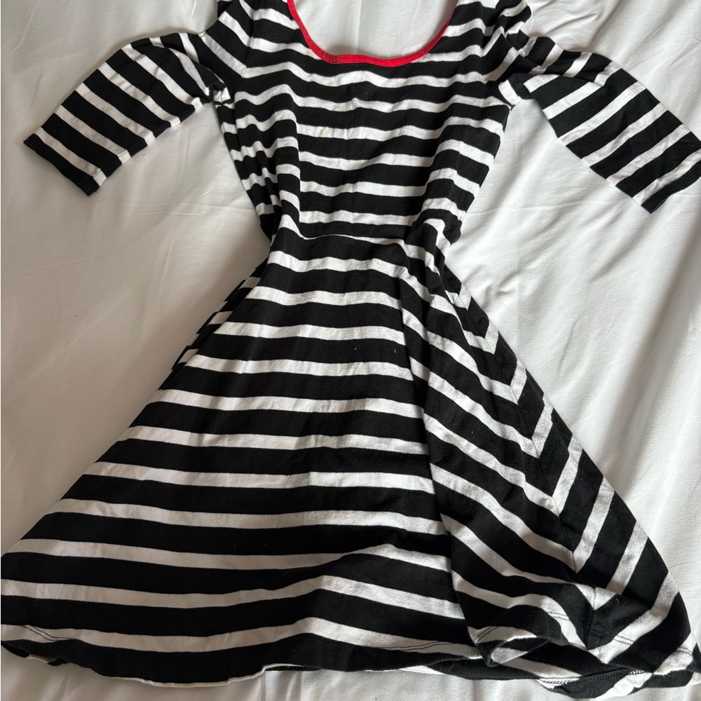 Black and White Striped Dress with Red Trim
